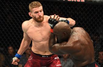 WINNIPEG, CANADA - DECEMBER 16: (L-R) Jan Blachowicz of Poland punches Jared Cannonier in their light heavyweight bout during the UFC Fight Night event at Bell MTS Place on December 16, 2017 in Winnipeg, Manitoba, Canada. (Photo by Josh Hedges/Zuffa LLC/Zuffa LLC via Getty Images)