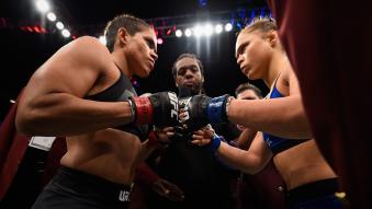 Amanda Nunes of Brazil and Ronda Rousey touch gloves in their UFC women's bantamweight championship bout during the UFC 207 event at T-Mobile Arena on December 30, 2016 in Las Vegas, Nevada. (Photo by Jeff Bottari/Zuffa Getty Images)