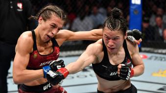 Zhang Weili of China punches Joanna Jedrzejczyk of Poland in their UFC strawweight championship fight during the UFC 248 event at T-Mobile Arena on March 07, 2020 in Las Vegas, Nevada. (Photo by Jeff Bottari/Zuffa LLC)