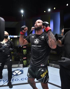 Thiago Santos of Brazil celebrates his victory over Johnny Walker of Brazil in their light heavyweight bout during the UFC Fight Night event at UFC APEX on October 02 2021 in Las Vegas Nevada. (Photo by Jeff Bottari/Zuffa LLC)