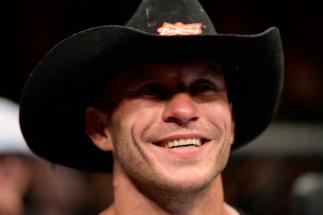 Donald "Cowboy" Cerrone celebrates after defeating Jim Miller in their lightweight bout during the UFC Fight Night event at Revel Casino on July 16, 2014 in Atlantic City, New Jersey. (Photo by Jeff Bottari/Zuffa LLC)