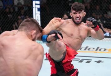 Arman Tsarukyan of Georgia kicks Mateusz Gamrot of Poland in a lightweight fight during the UFC Fight Night event at UFC APEX on June 25, 2022 in Las Vegas, Nevada. (Photo by Jeff Bottari/Zuffa LLC)