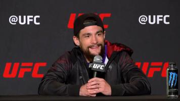 Jay Perrin takes questions from the media at UFC 282 media day