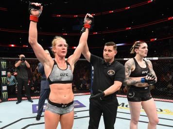 Holly Holm celebrates after defeating Megan Anderson of Australia in their women's featherweight fight during the UFC 225 event at the United Center on June 9, 2018 in Chicago, Illinois. (Photo by Josh Hedges/Zuffa Getty Images)