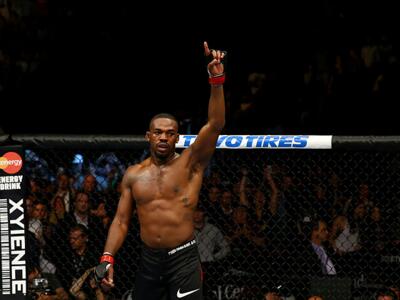 NEWARK, NJ - APRIL 27:  Jon Jones celebrates his knockout against Chael Sonnen to win their light heavyweight championship bout during the UFC 159 event at the Prudential Center on April 27, 2013 in Newark, New Jersey.  (Photo by Al Bello/Zuffa LLC/Zuffa 